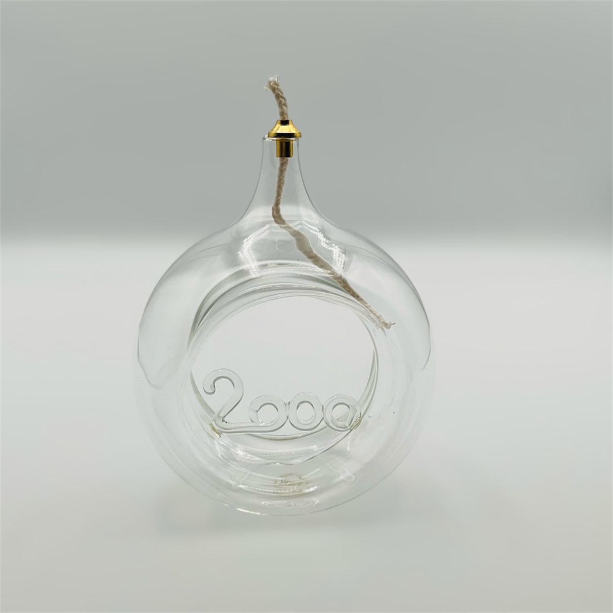 Lampada ad olio in vetro trasparente