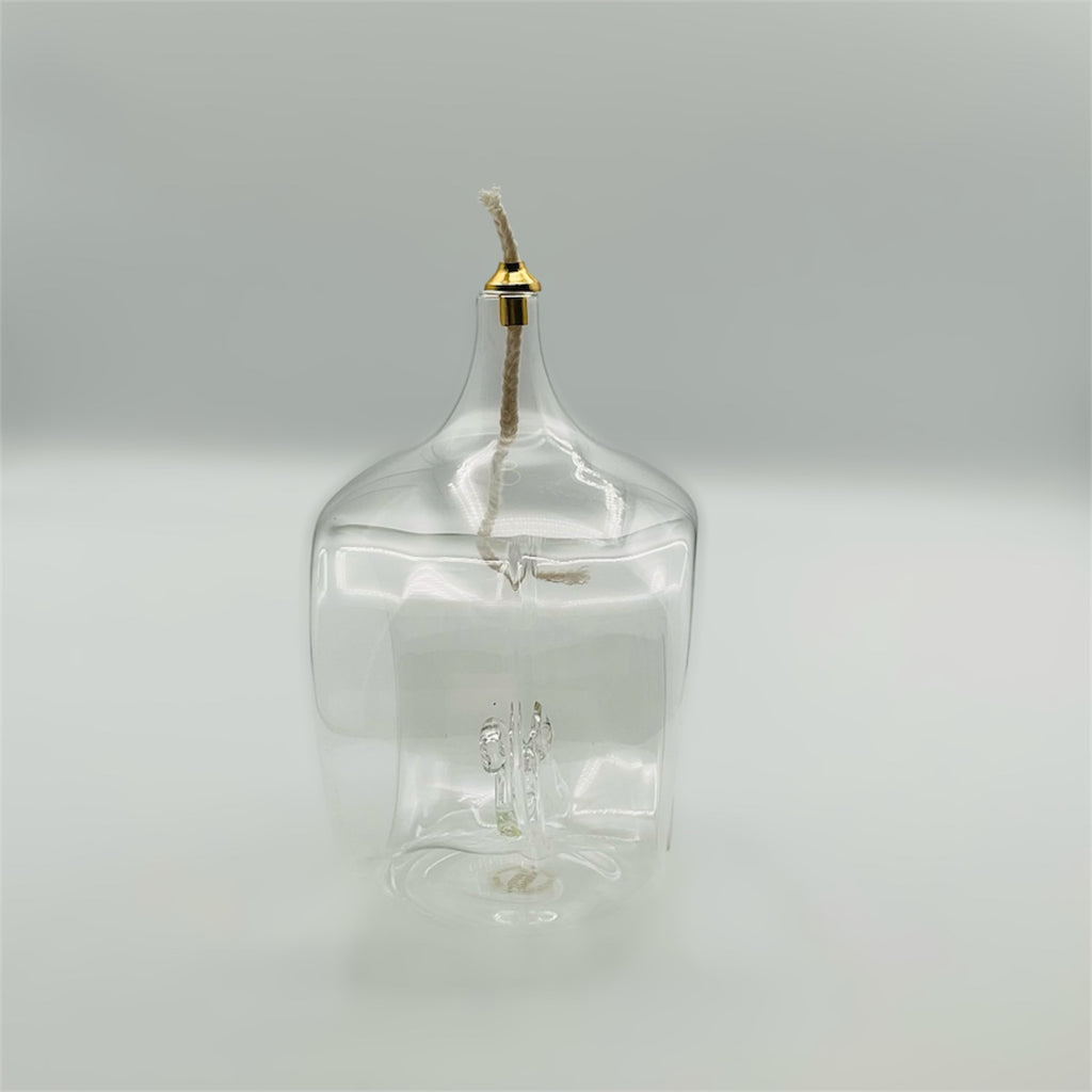 Lampada ad olio in vetro trasparente
