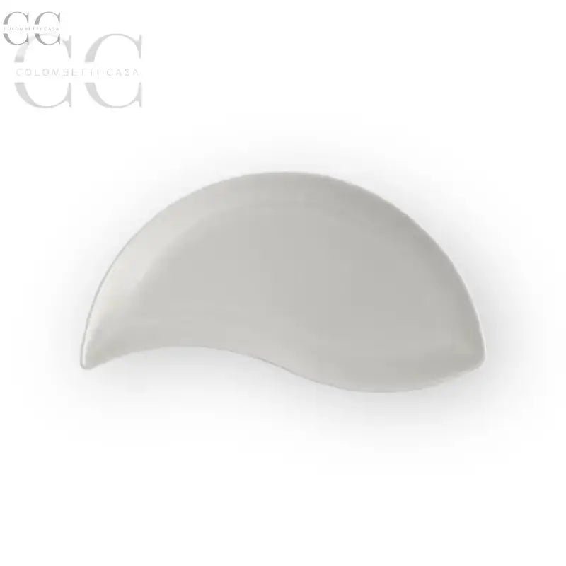 Piatto bianco a forma di mezzaluna della collezione New Wave di Villeroy & Boch