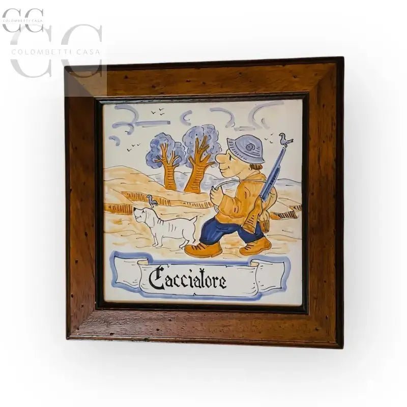 Framed ceramic tile of Mestieri Il Cacciatore with dog in Legno Tarlato design