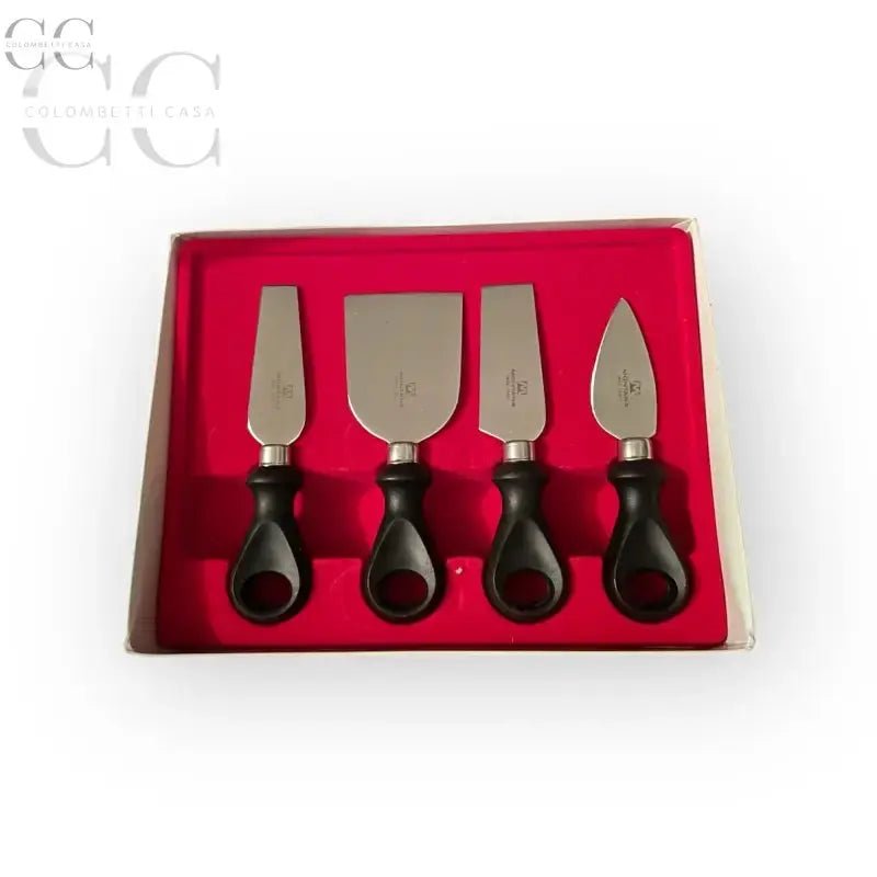 Set di coltelli grana Montana con manici neri, ideale per formaggi grana tipo