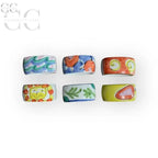 Set di sei portatovaglioli in ceramica decorata a mano, colorati e unici