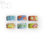 Set di sei portatovaglioli in ceramica decorata a mano, colorati e unici