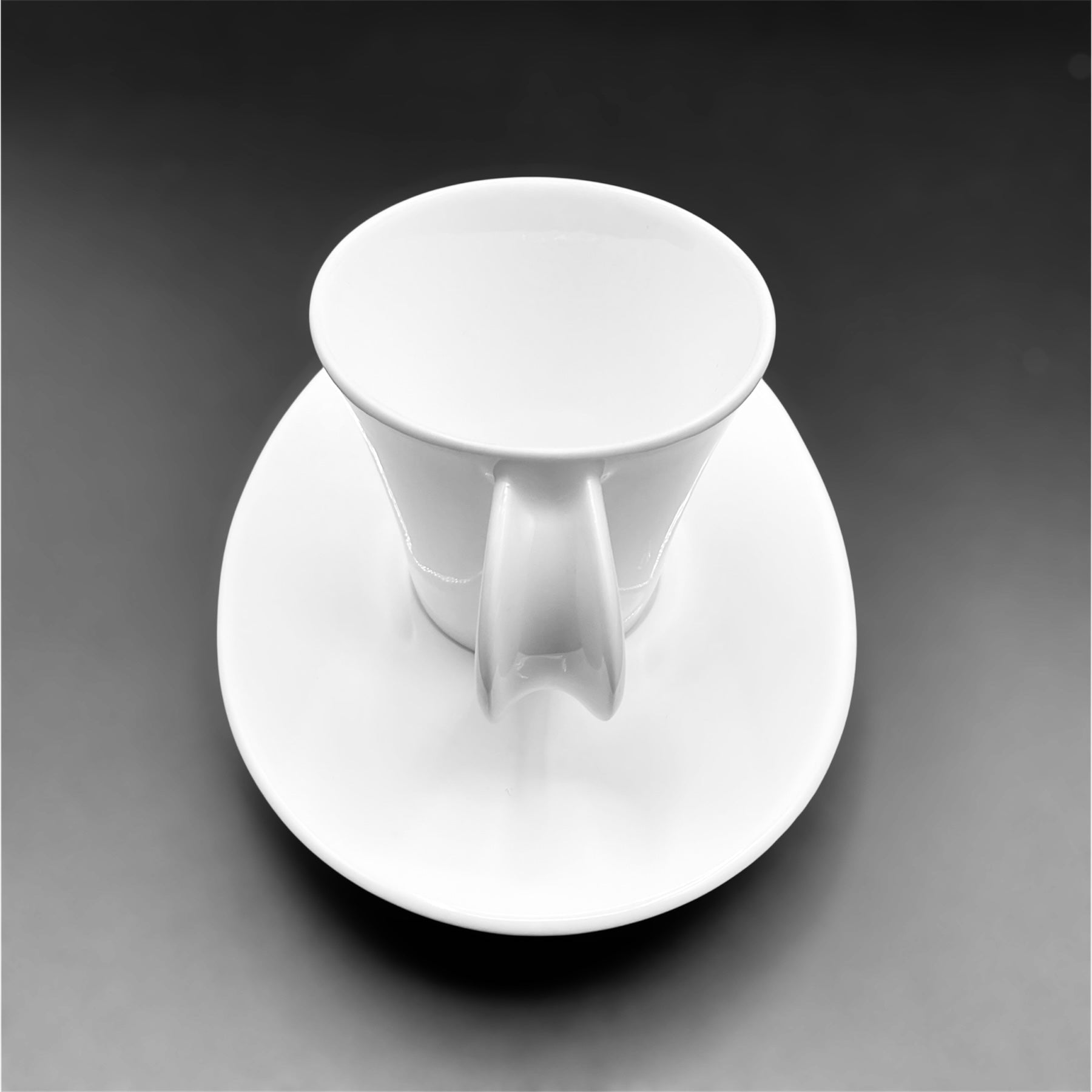 Set 6 tazze caffè Funé by Giugiaro porcellana Ginori white coffee cup and oval saucer set view from above.