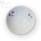 Bowl bianco con motivi a stelle e punti della collezione Richard Ginori