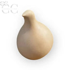 Figurina di uccello ceramica beige nella Statuina colomba stilizzata ceramica albicocca