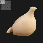 Statuina colomba stilizzata in ceramica color albicocca elegante e decorativa