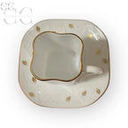 Elegante tazza e piatto bianco e oro della collezione Richard Ginori