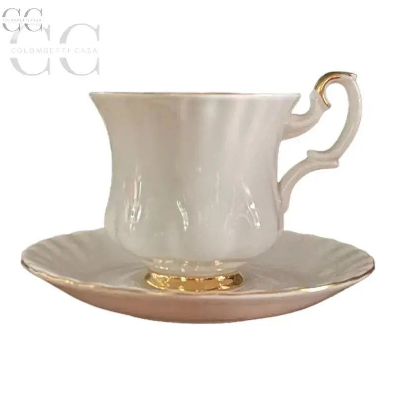 Elegante tazzina e piattino Royal Albert in porcellana bianca con bordi dorati